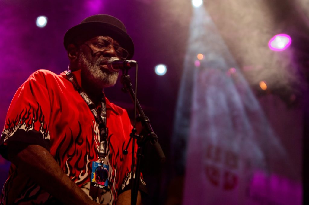 close up photo of man singing